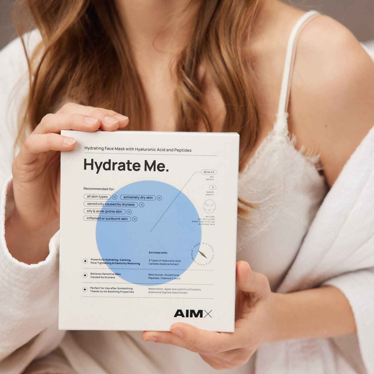 Lerelle Beauty Aimx Hydrate Me Korean sheet mask box held by model