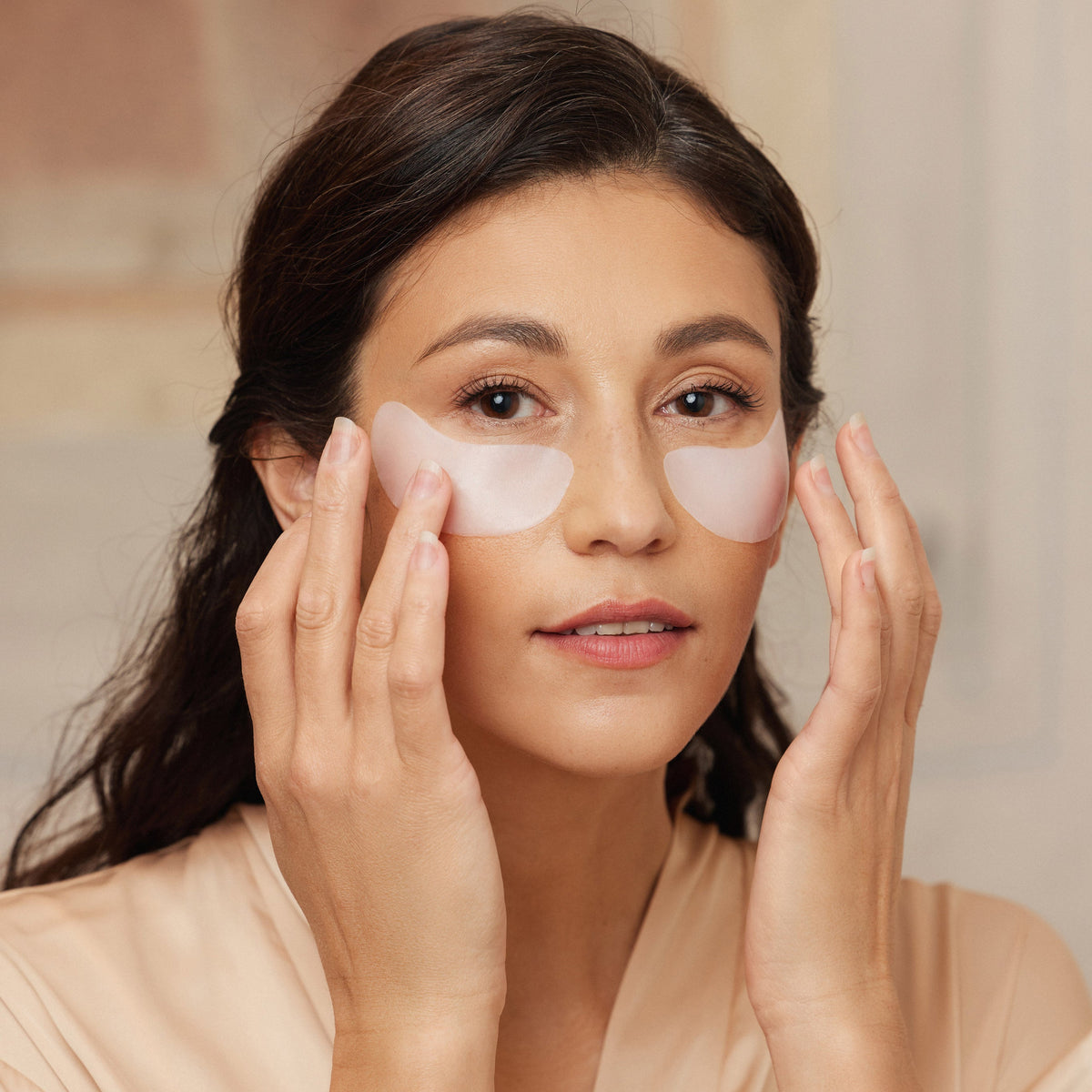 Lerelle Beauty AIMX Revive Me Korean bio-cellulose under-eye masks being applied under the eyes