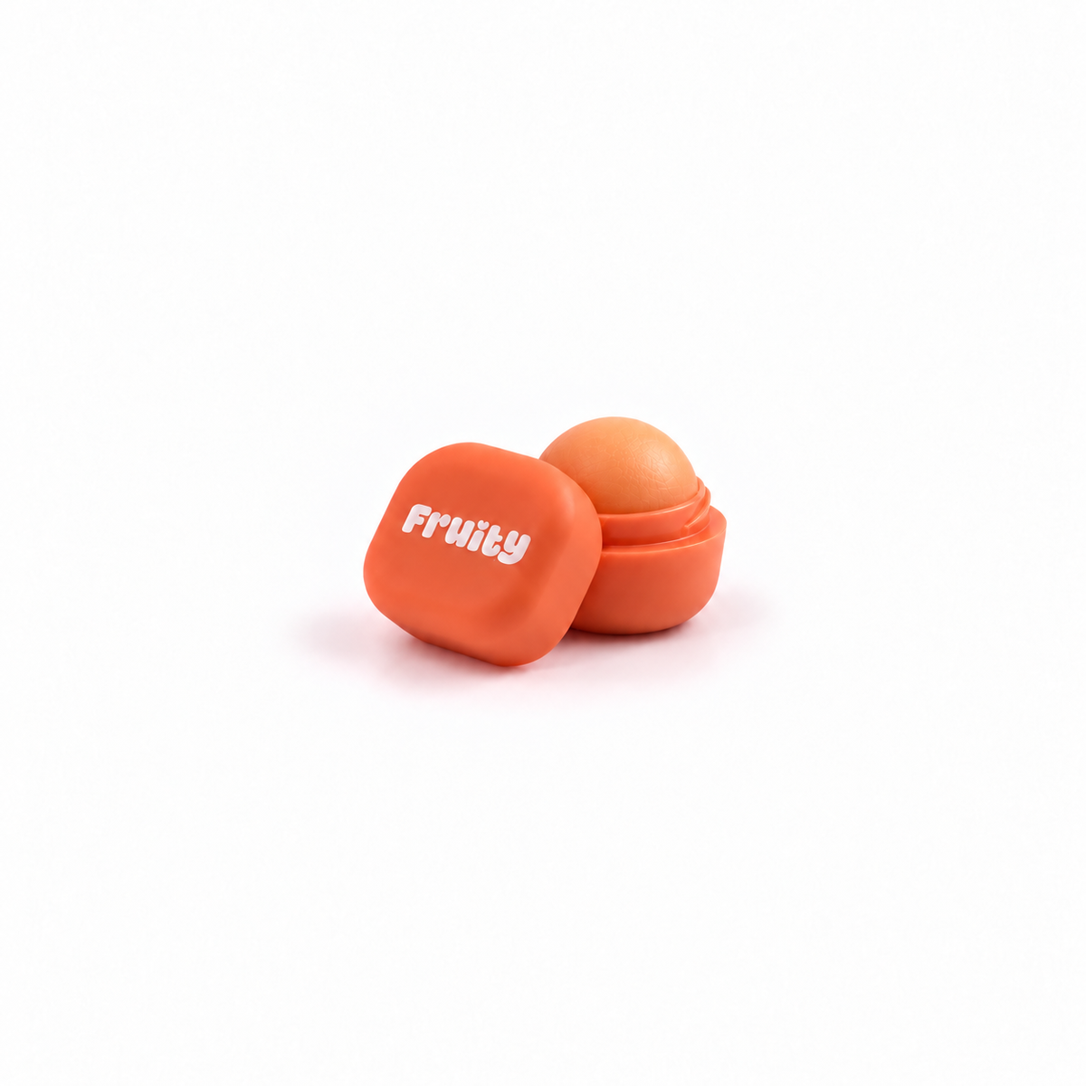 Lerelle Beauty Fruity peach lip balm in an open orange pot with the lid beside it