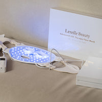 Lerelle Beauty LED light therapy face mask in blue light mode with remote controller and packaging