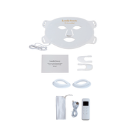 Lerelle Beauty LED light therapy face mask set with remote controller, eye shields, charging cables, manual and travel bag