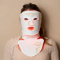 Lerelle Beauty LED light therapy face, neck and décolletage mask set worn in red light mode